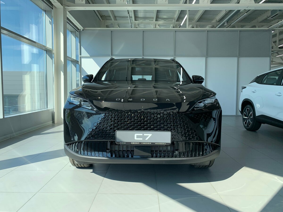 Открыть фотографии: Omoda C7