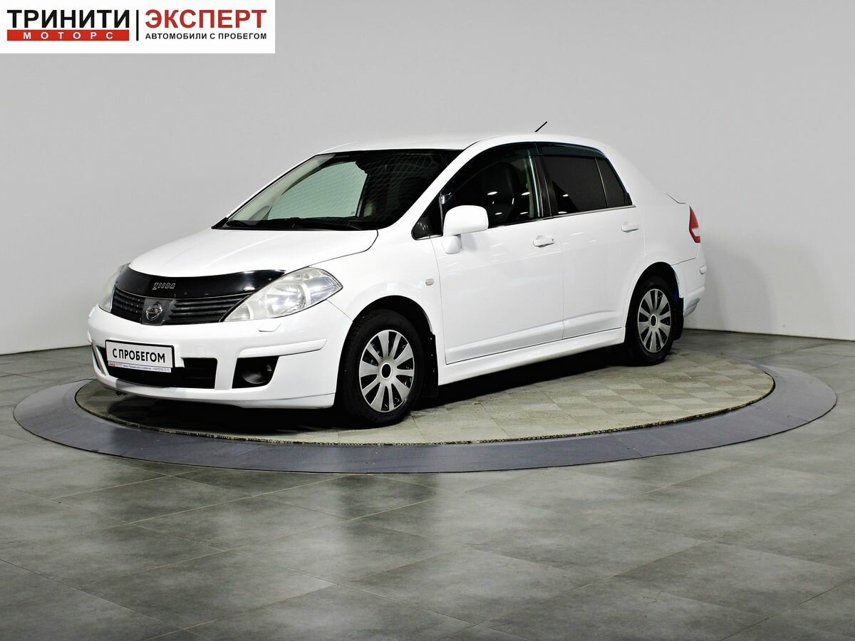 Открыть фотографии: Nissan Tiida I Рестайлинг