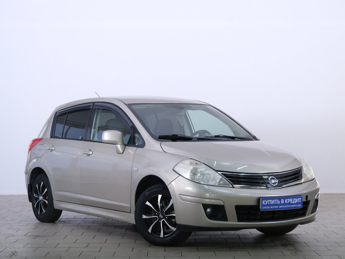 Открыть фотографии: Nissan Tiida I Рестайлинг