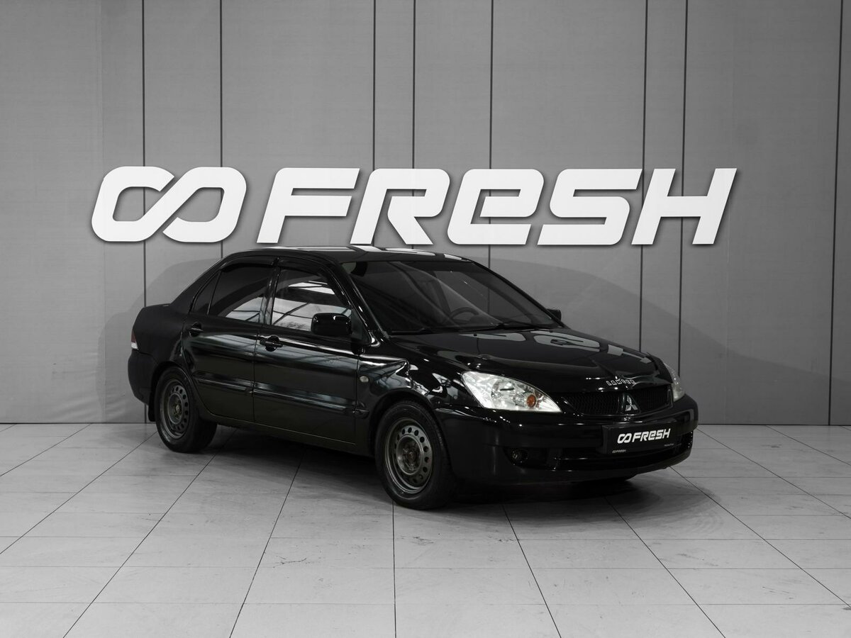 Открыть фотографии: Mitsubishi Lancer IX Рестайлинг