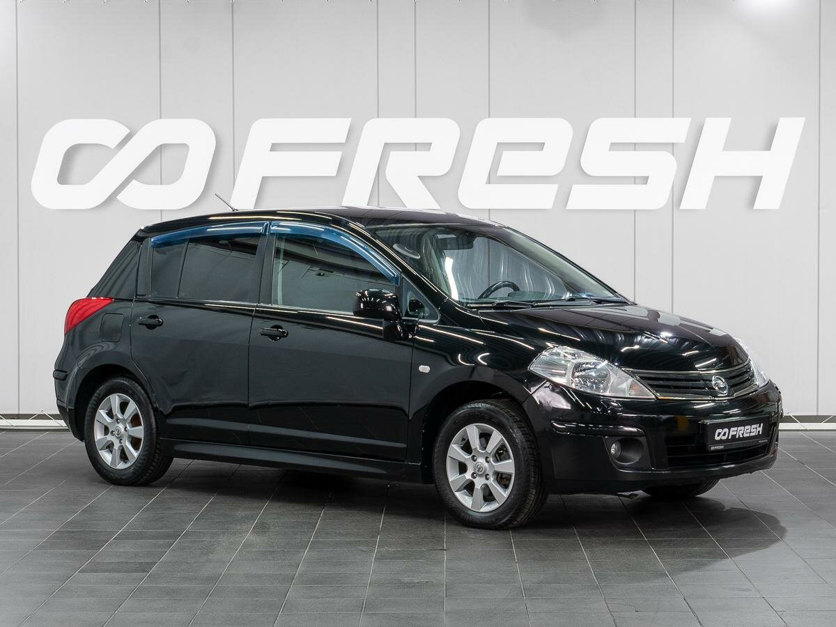 Открыть фотографии: Nissan Tiida I
