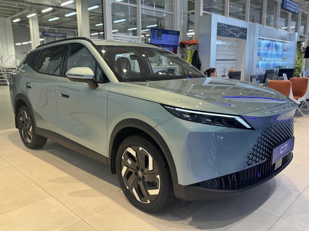 Открыть фотографии: Omoda C7