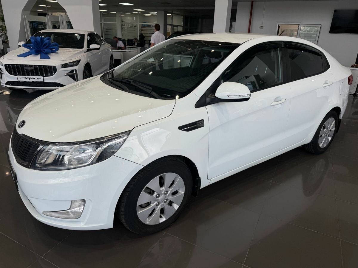 Открыть фотографии: Kia Rio III