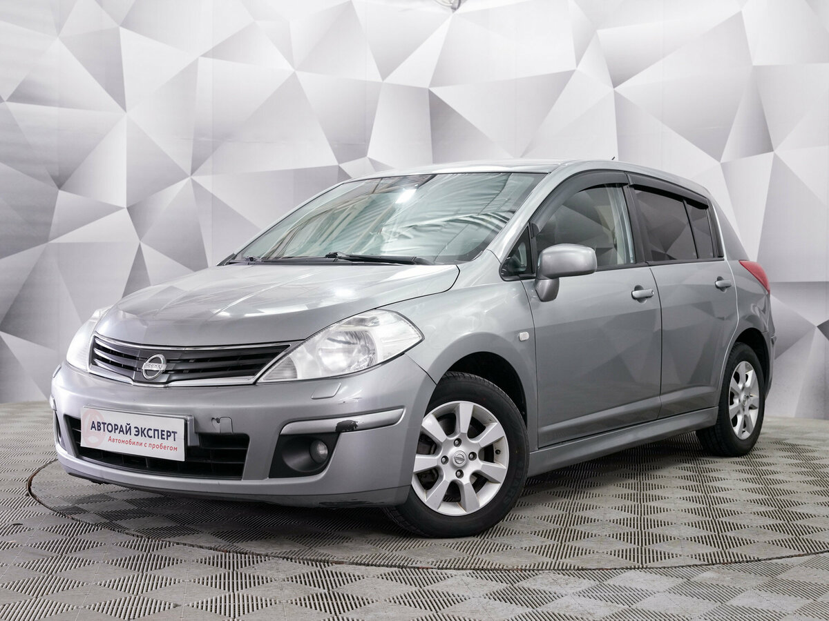 Открыть фотографии: Nissan Tiida I Рестайлинг