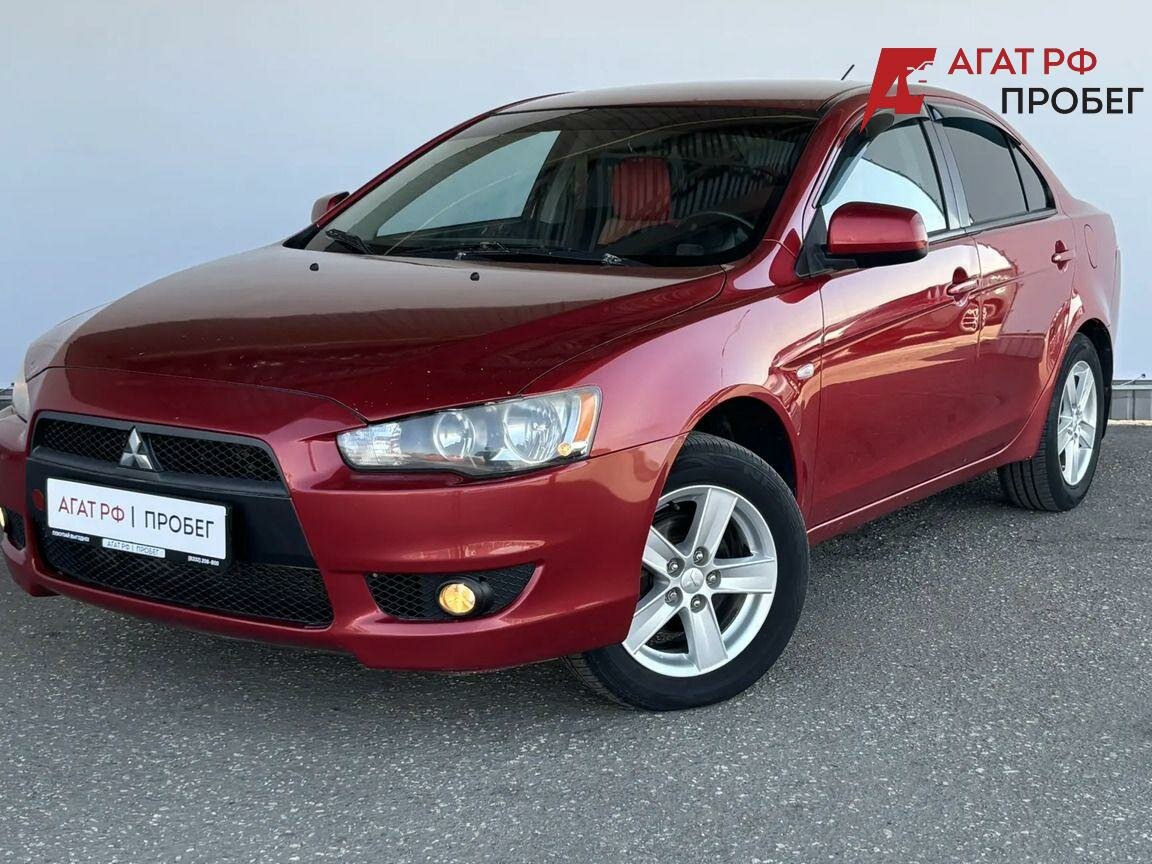 Открыть фотографии: Mitsubishi Lancer X