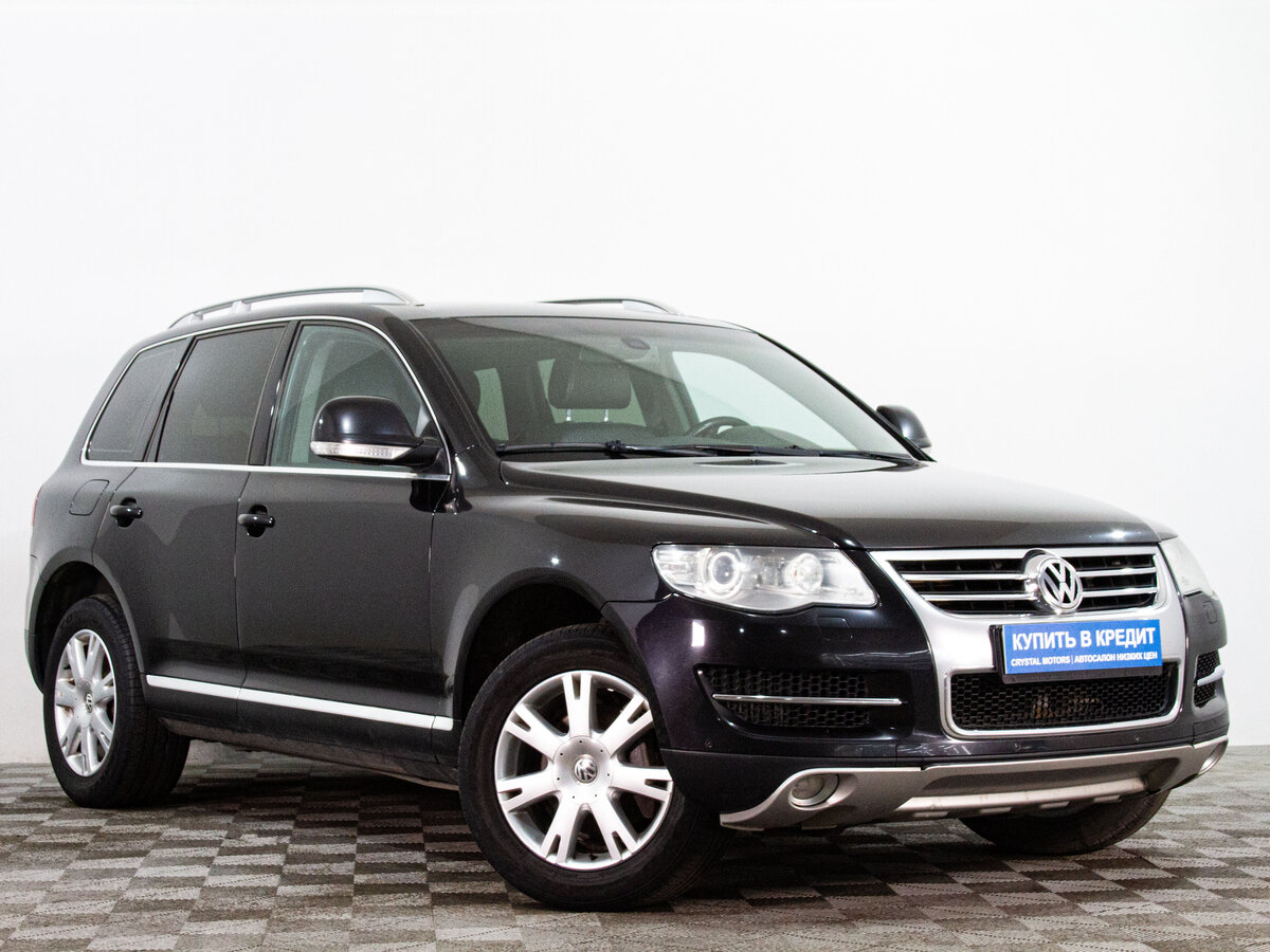 Открыть фотографии: Volkswagen Touareg I Рестайлинг