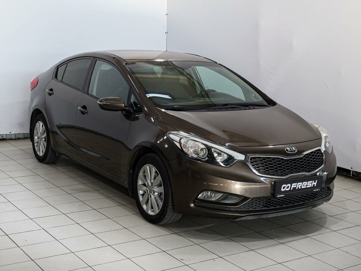 Открыть фотографии: Kia Cerato III