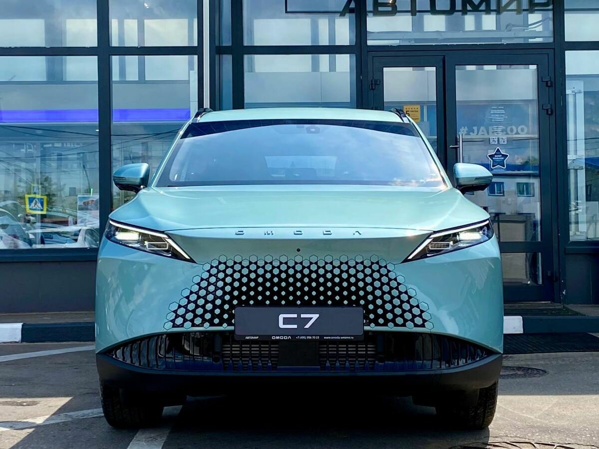 Открыть фотографии: Omoda C7