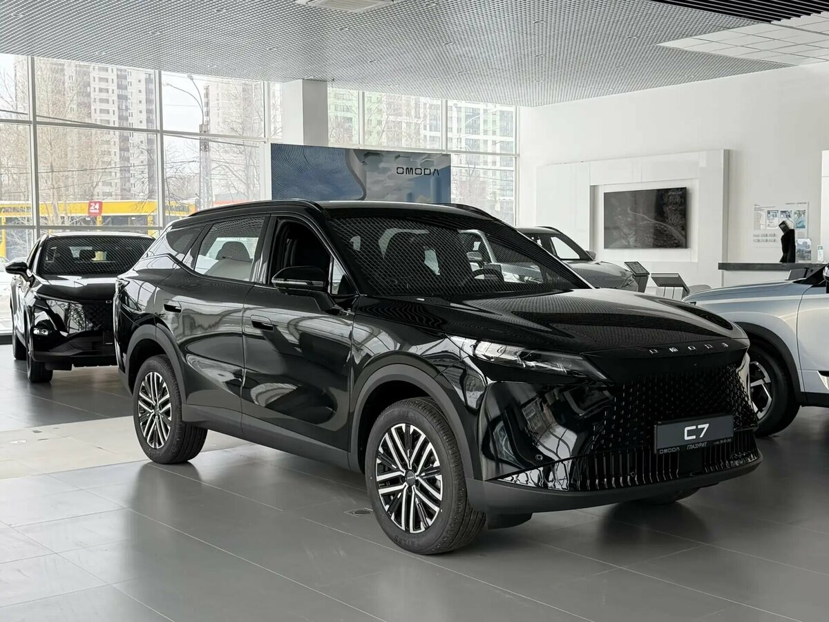 Открыть фотографии: Omoda C7