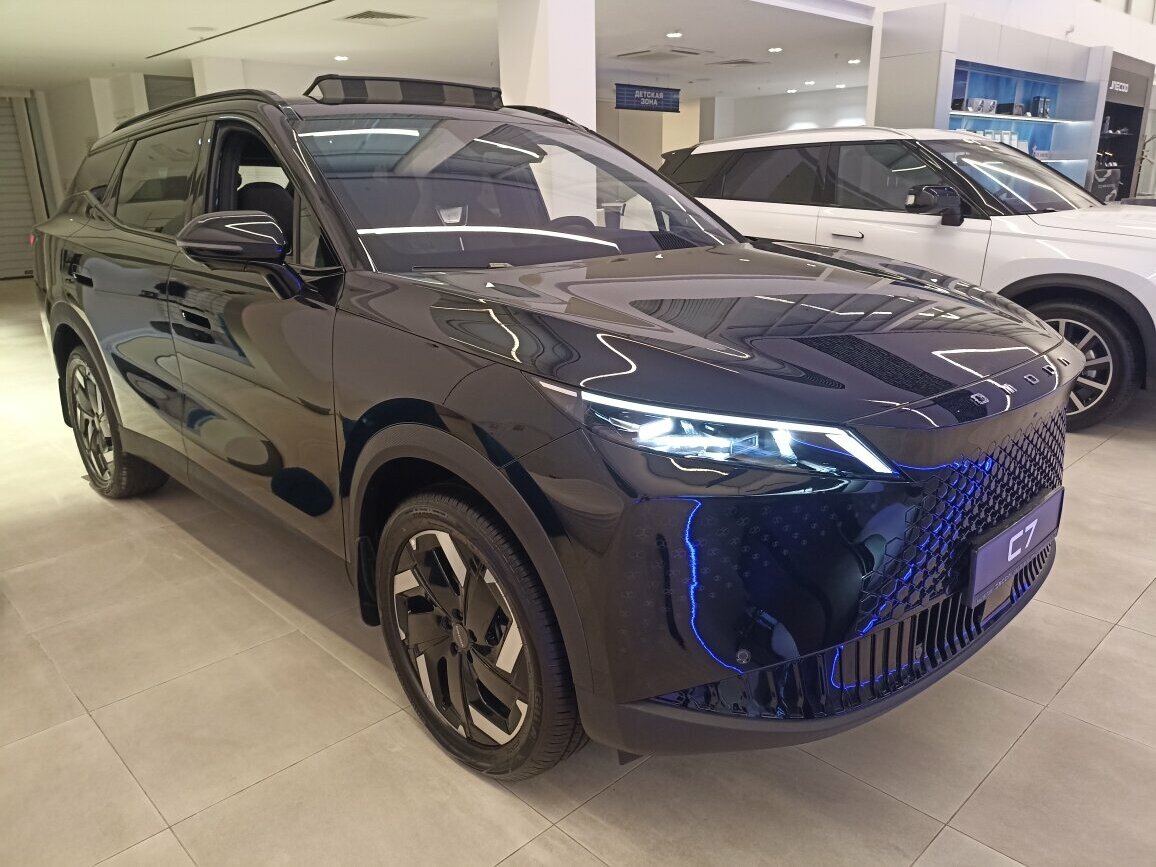 Открыть фотографии: Omoda C7