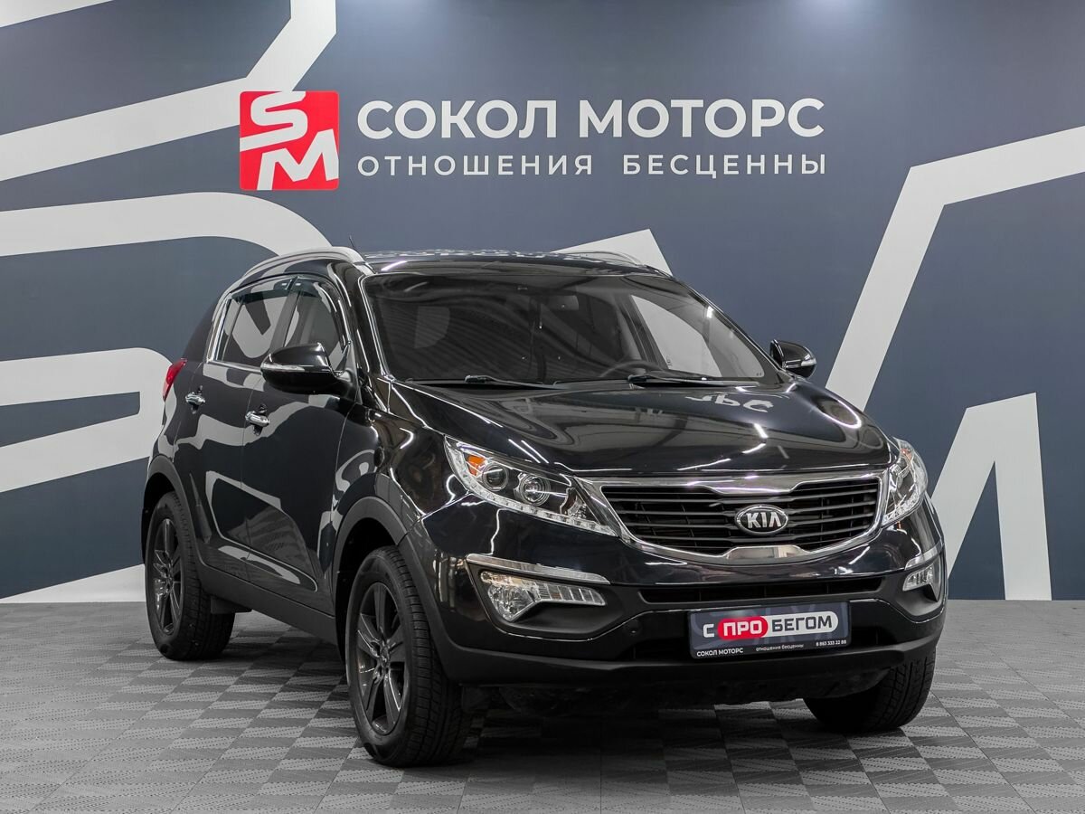 Открыть фотографии: Kia Sportage III