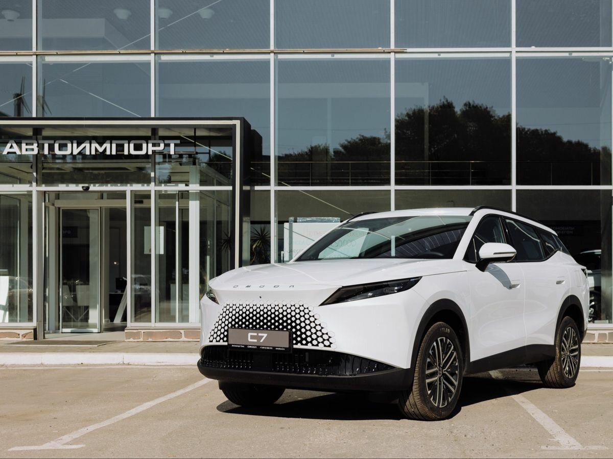 Открыть фотографии: Omoda C7