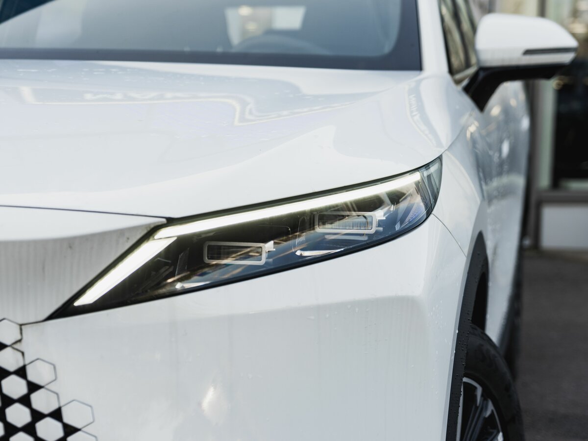 Открыть фотографии: Omoda C7