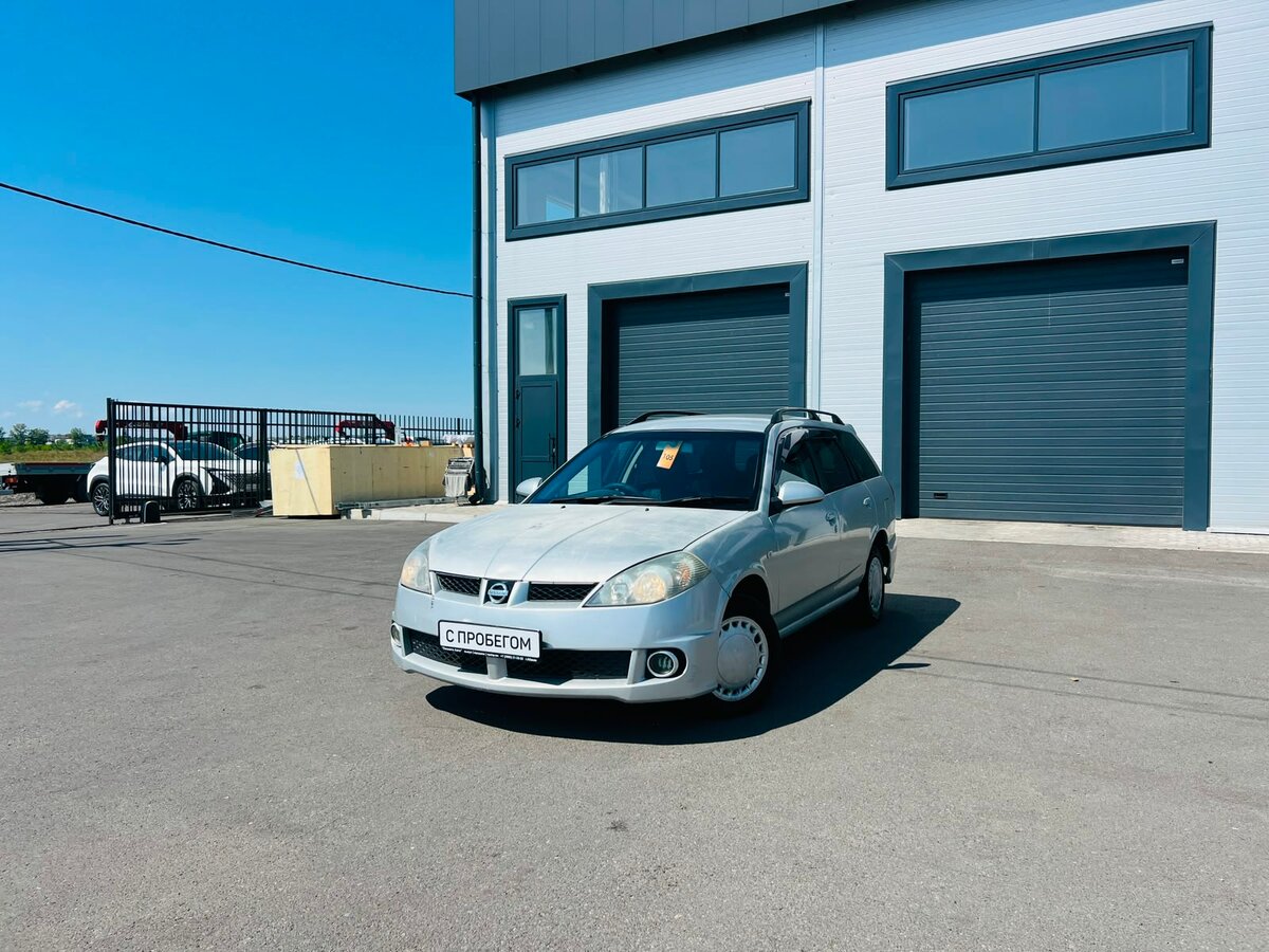 Открыть фотографии: Nissan Wingroad II (Y11)