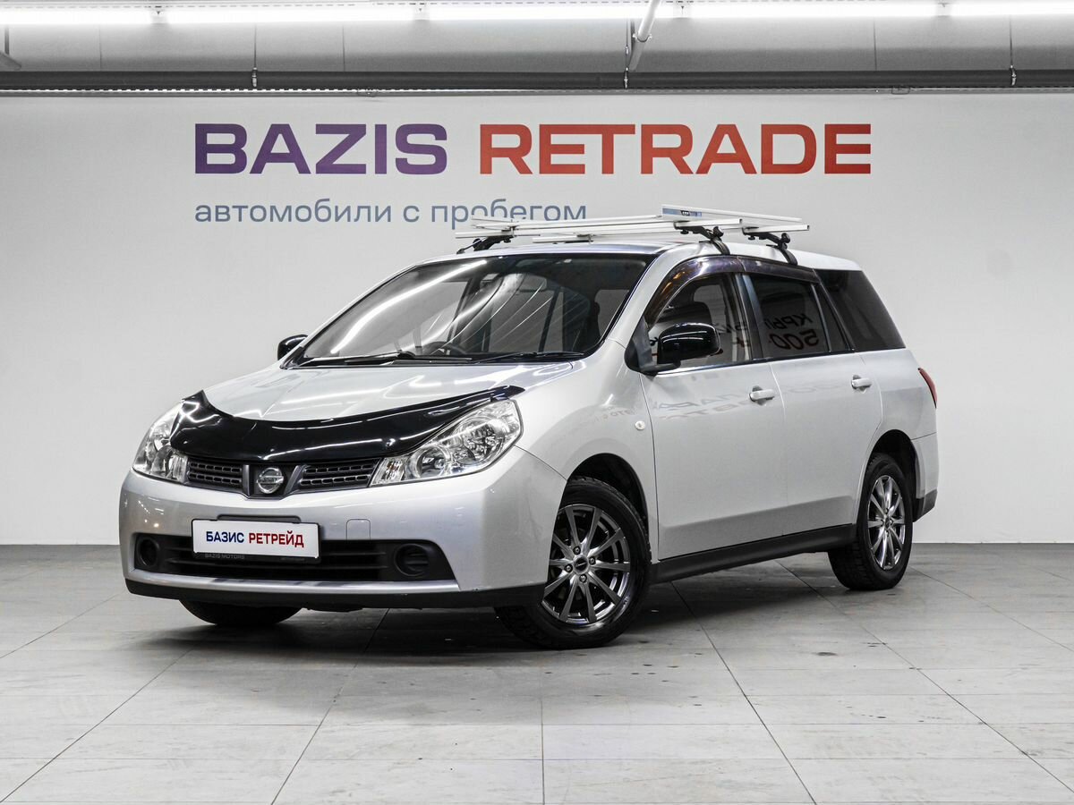Открыть фотографии: Nissan Wingroad III (Y12)