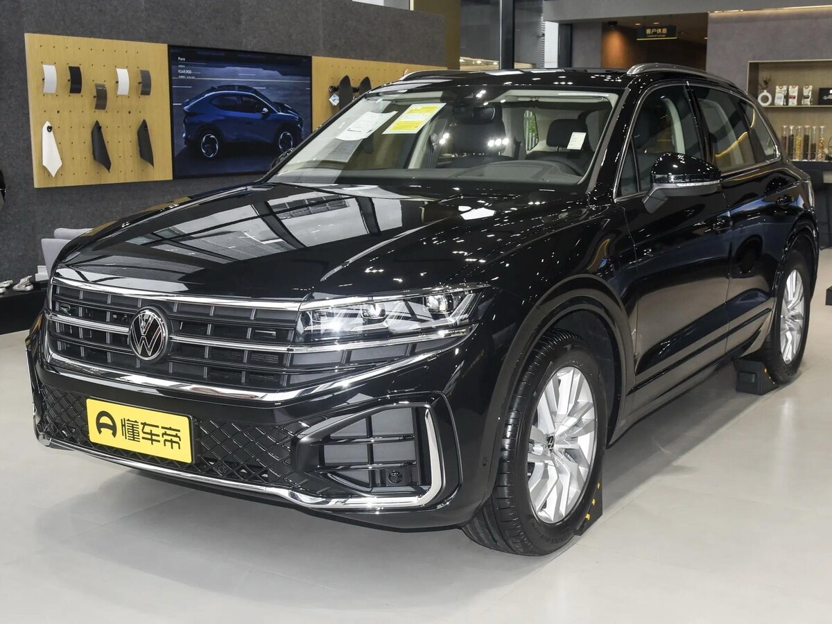 Открыть фотографии: Volkswagen Touareg III Рестайлинг
