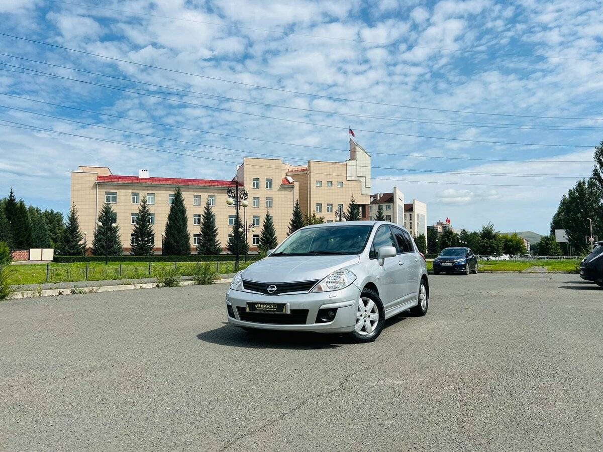 Открыть фотографии: Nissan Tiida I Рестайлинг