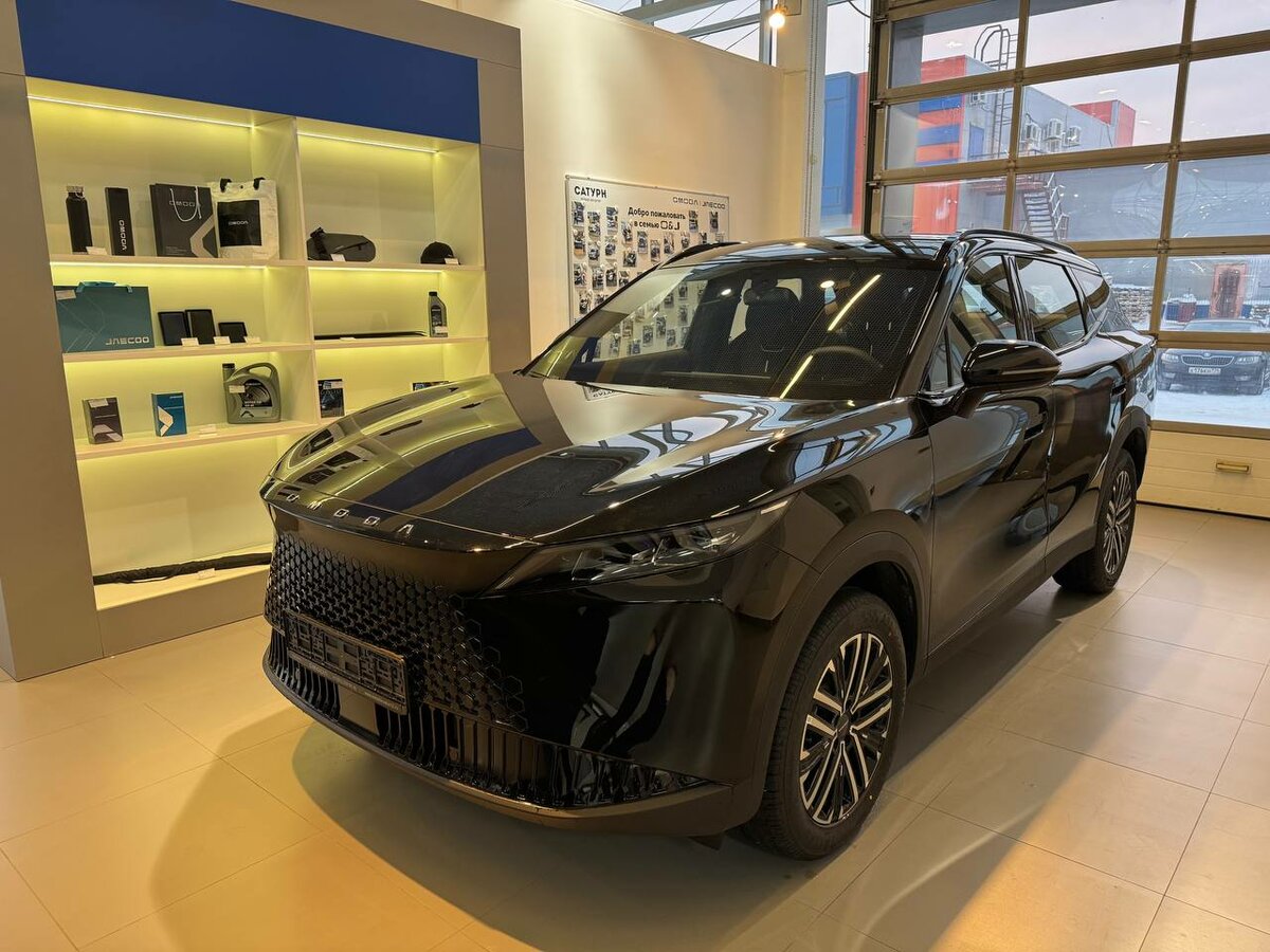 Открыть фотографии: Omoda C7