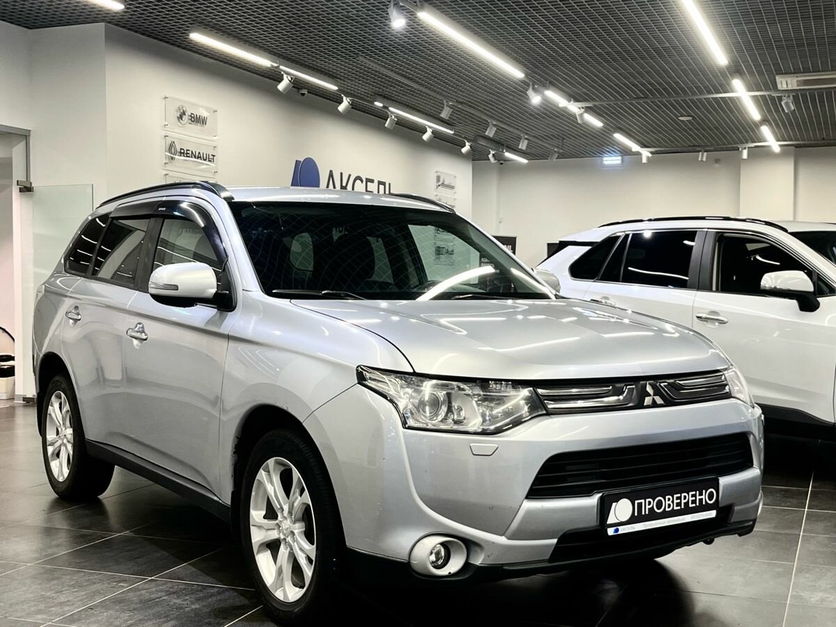 Открыть фотографии: Mitsubishi Outlander III