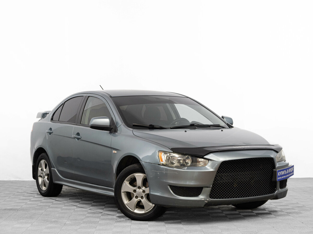 Открыть фотографии: Mitsubishi Lancer X