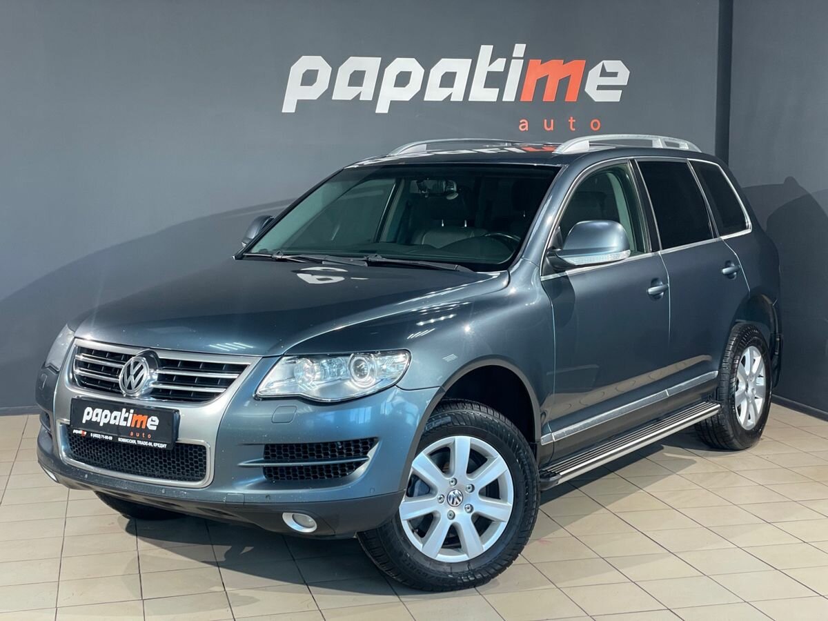 Открыть фотографии: Volkswagen Touareg I Рестайлинг