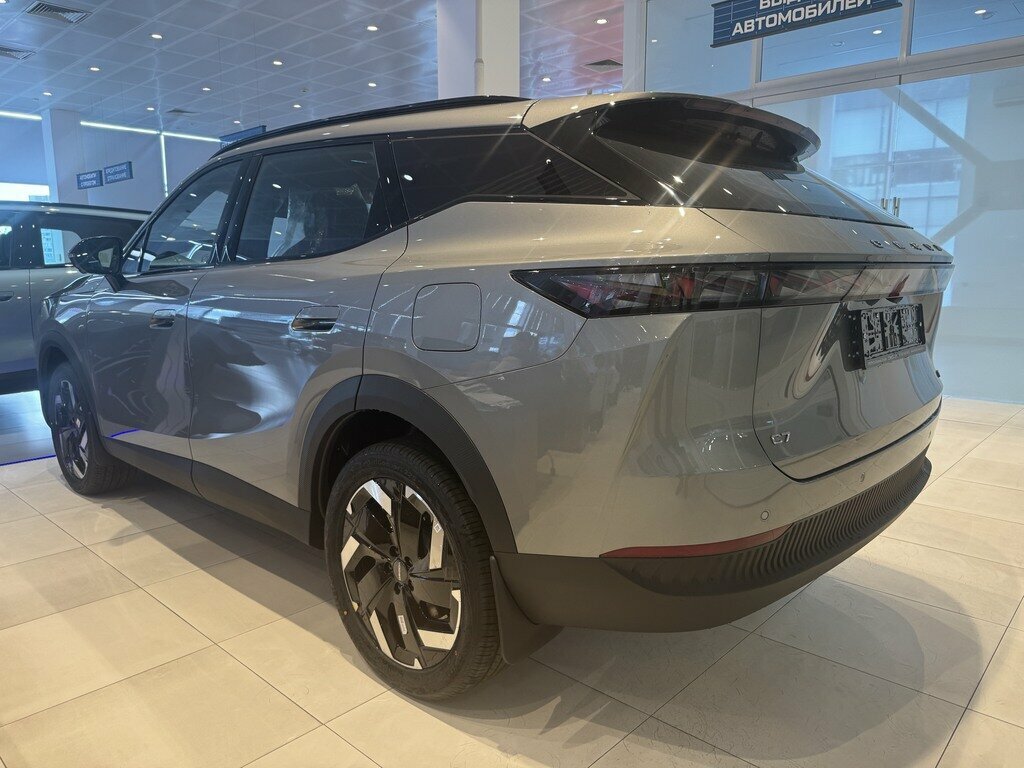 Открыть фотографии: Omoda C7