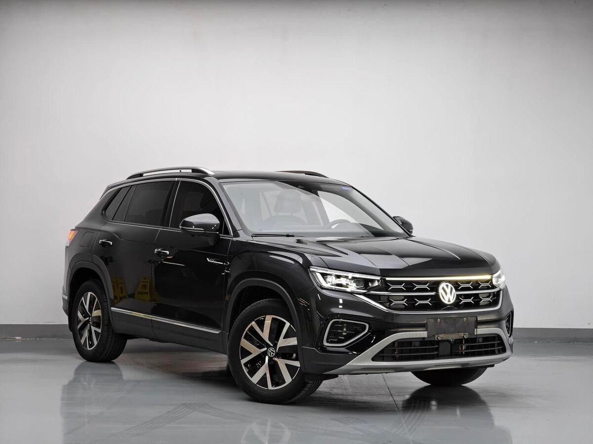 Открыть фотографии: Volkswagen Tayron I Рестайлинг