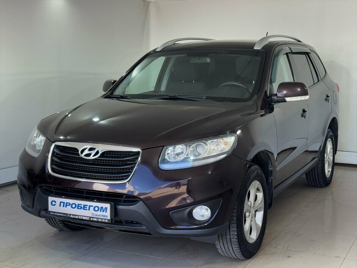 Открыть фотографии: Hyundai Santa Fe II Рестайлинг