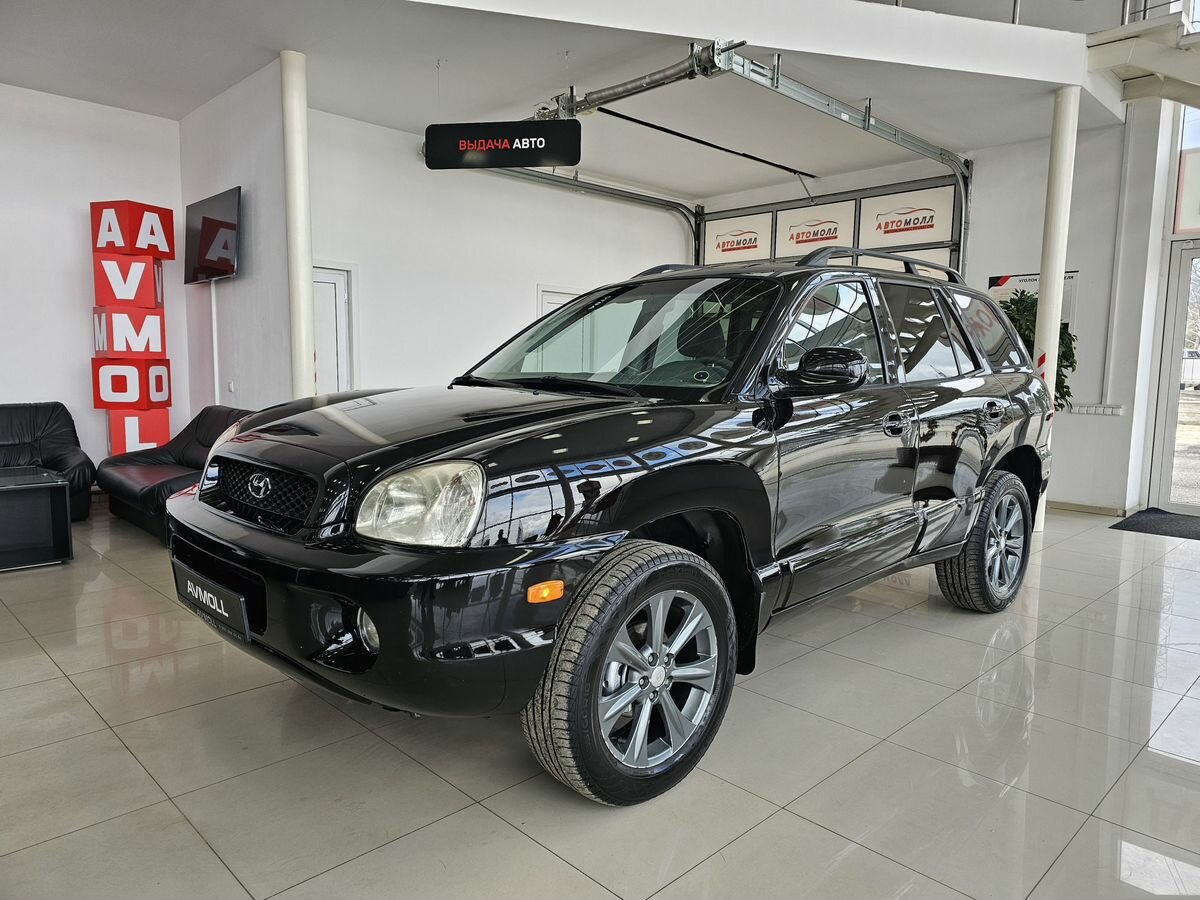 Открыть фотографии: Hyundai Santa Fe I