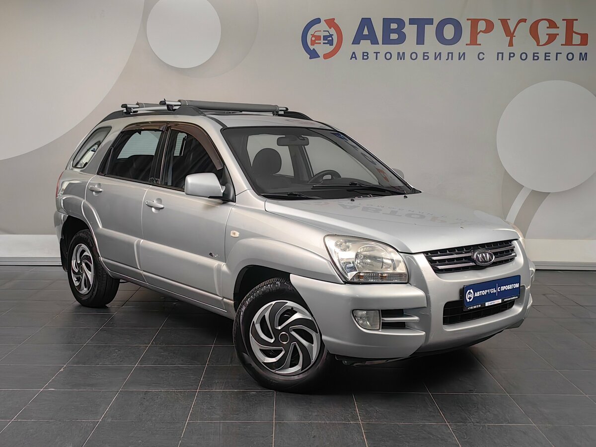 Открыть фотографии: Kia Sportage II