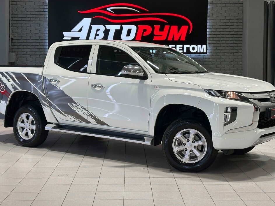 Открыть фотографии: Mitsubishi L200 V Рестайлинг