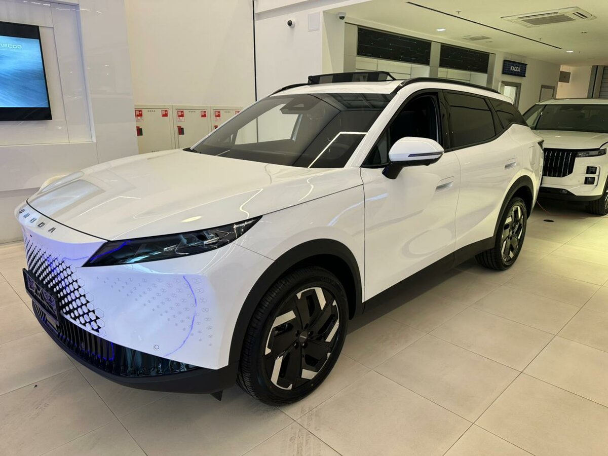 Открыть фотографии: Omoda C7
