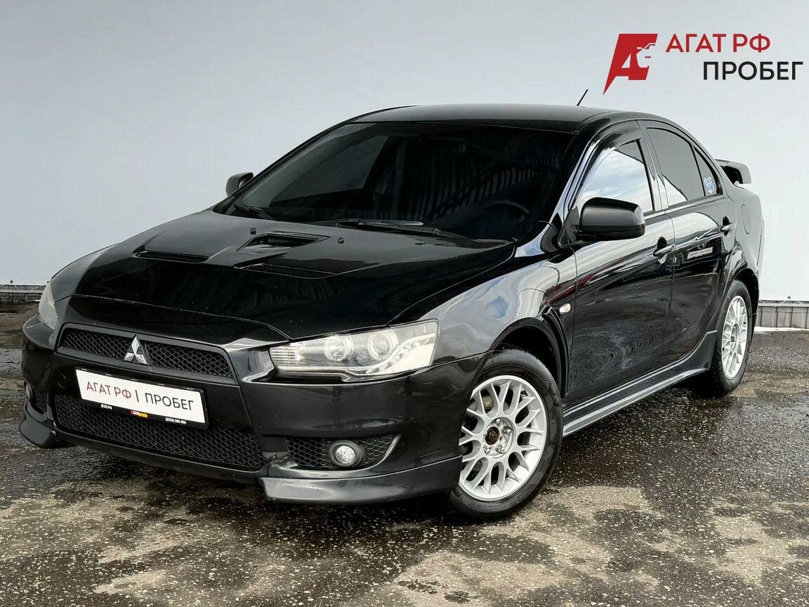 Открыть фотографии: Mitsubishi Lancer X