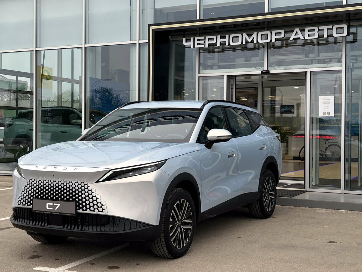 Открыть фотографии: Omoda C7