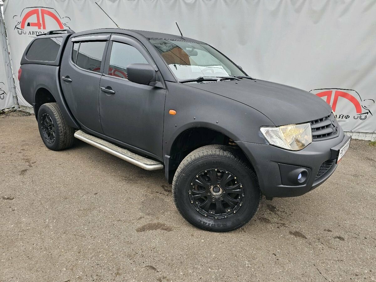 Открыть фотографии: Mitsubishi L200 IV