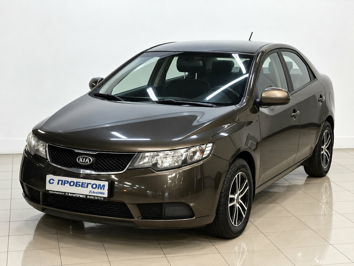 Открыть фотографии: Kia Cerato II