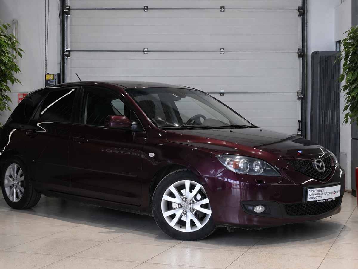 Открыть фотографии: Mazda 3 I (BK) Рестайлинг
