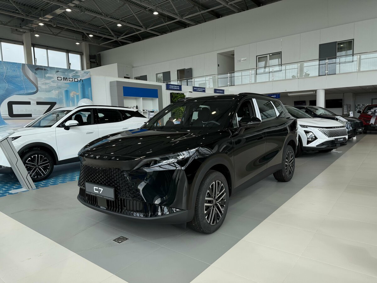 Открыть фотографии: Omoda C7