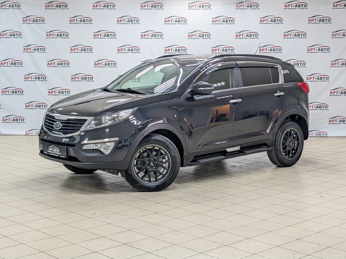 Открыть фотографии: Kia Sportage III