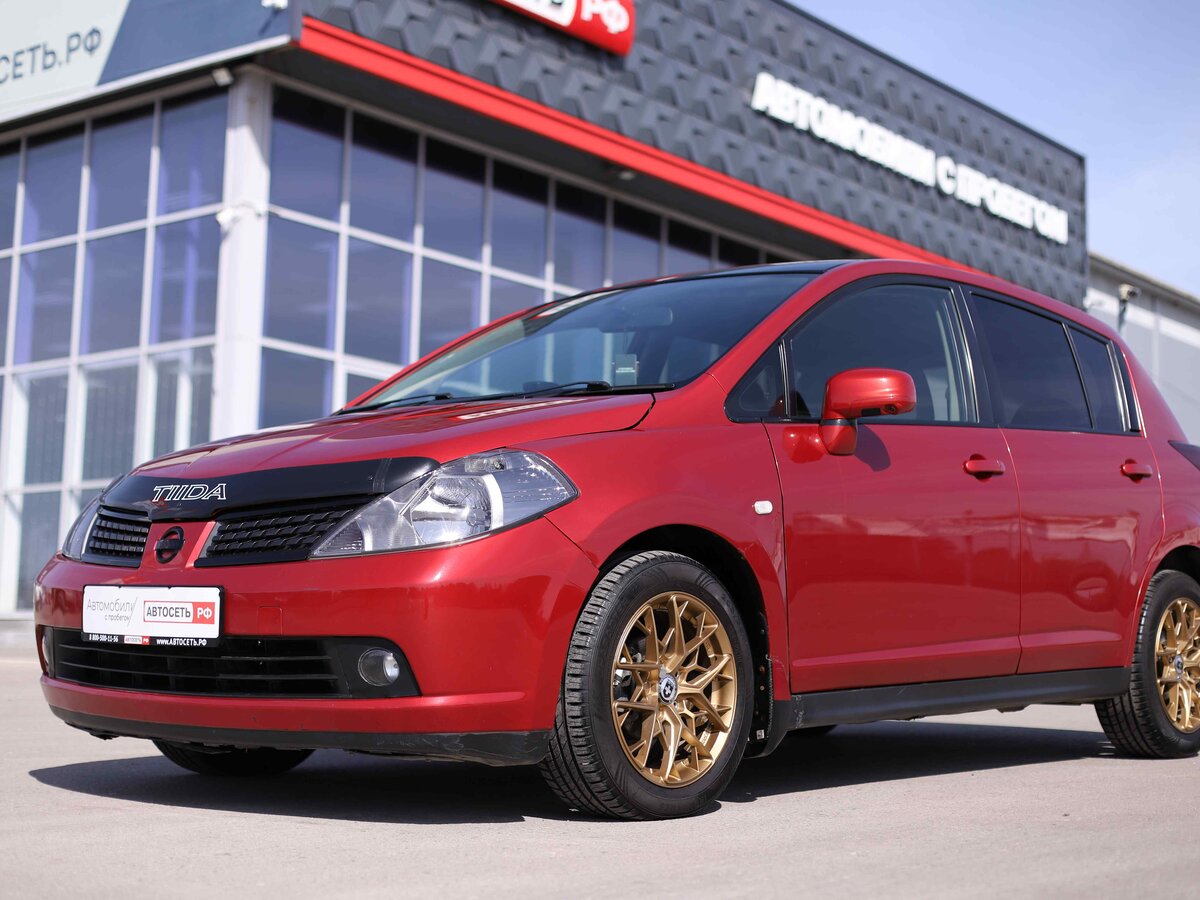 Открыть фотографии: Nissan Tiida I
