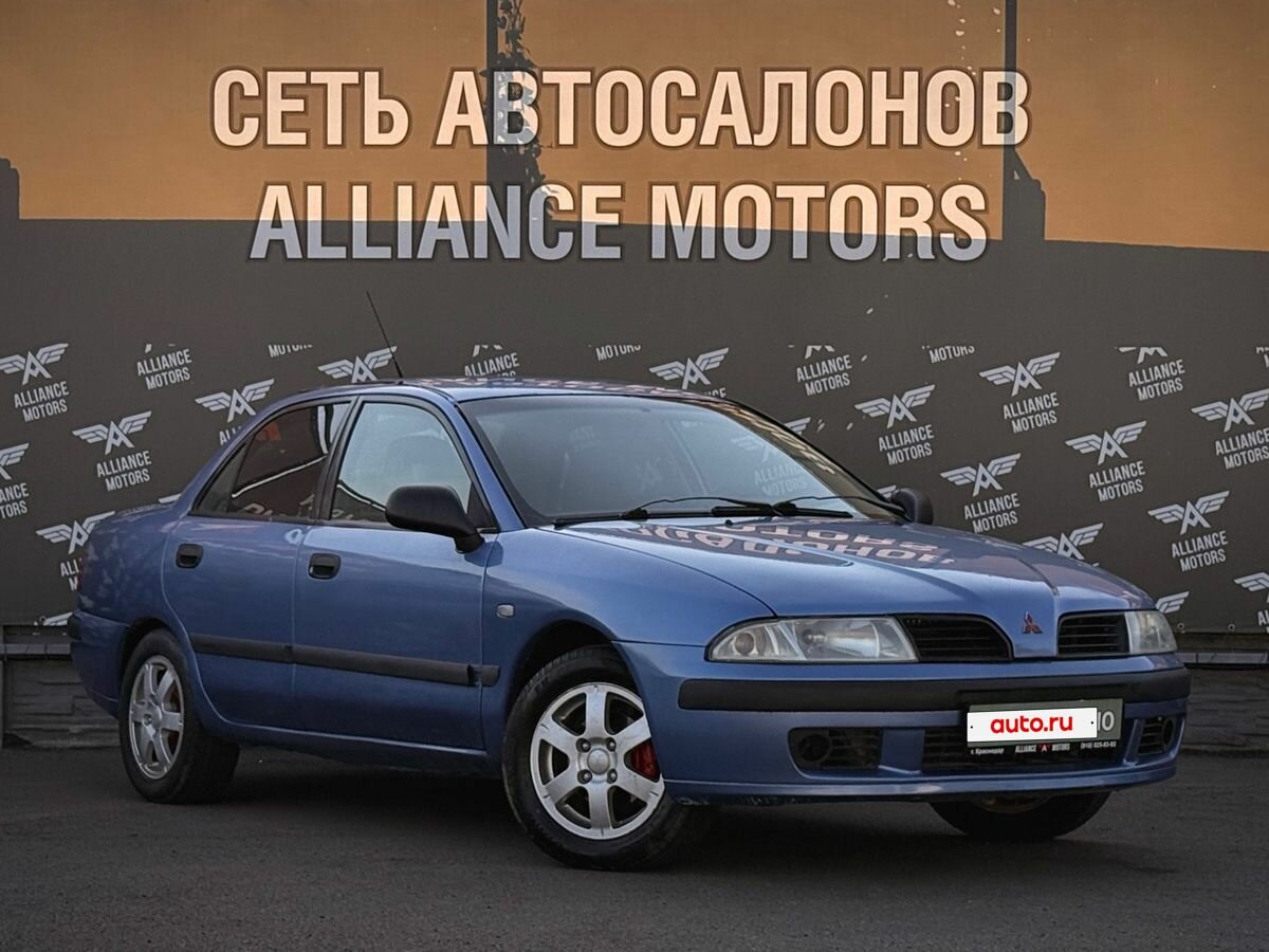 Открыть фотографии: Mitsubishi Carisma I Рестайлинг
