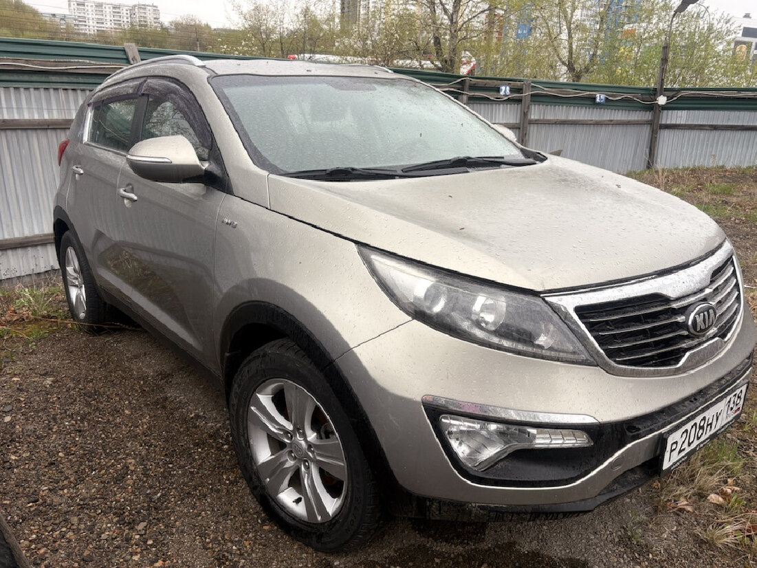Открыть фотографии: Kia Sportage III